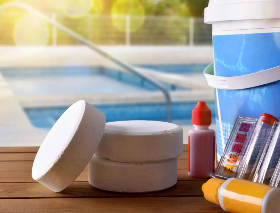 Pool technician testing water